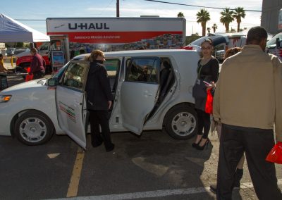 People viewing a Car Share demonstration.