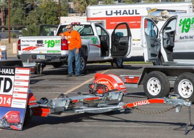 A U-Haul auto transport trailer.