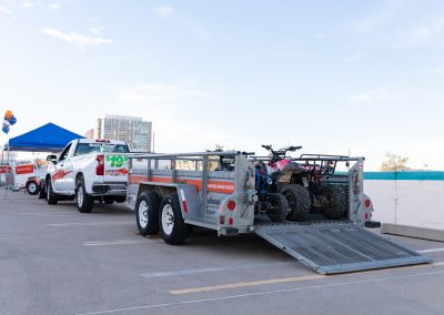 ATVs in a U-Haul Utility Trailer.