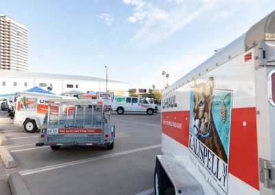 Different types of U-Haul trailers on display.