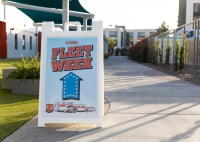 Sign that reads “Fleet Week” outside the U-Haul Shoen center.