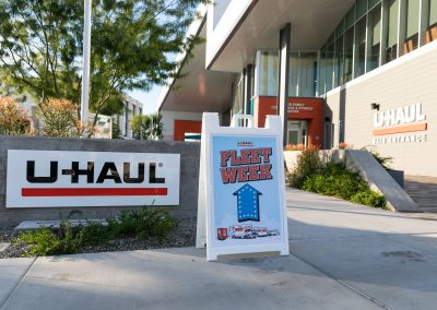 A sign for U-Haul Fleet Week set up outdoors.